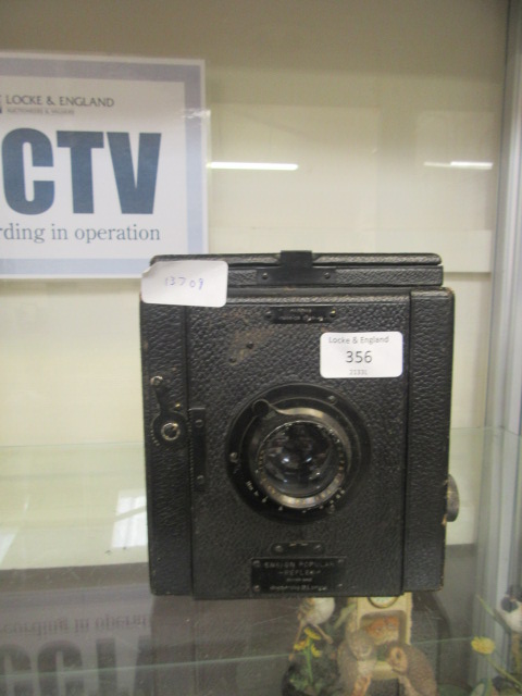 An early 20th century Ensign Popular Reflex camera by Houghtons of London