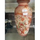 An oriental floral decorated vase