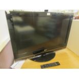 An LG flat screen television with remote