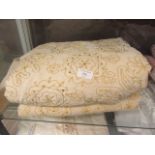 Two cream ground bed throws with embroidered and sequin elephant design