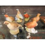 A selection of ceramic birds by Aynsley