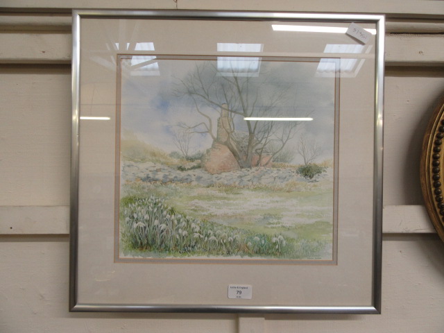 A framed and glazed watercolour of dilapidated cottage in field scene signed Monica Simkins