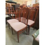 A set of four mid-20th century teak dining chairs (seats for sizing only)
