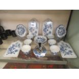 A selection of German Hutschenreuther blue and white ceramic ware to include cups, bowls,