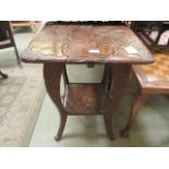 A mid-20th century carved top occasional table with under tier CONDITION REPORT: