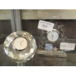 A Royal Doulton glass cased clock together with one other