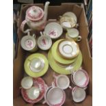 A tray containing ceramic tea ware to include Meakin, Minton,