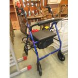 A blue metal tubular four wheeled walking aid