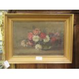 A framed oil on canvas of still life indistinctly signed