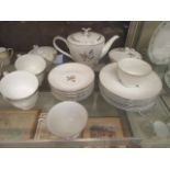 A Noritake part tea set comprising of cups, saucers, plates,