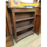 An early 20th-century oak open bookcase