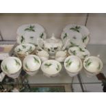 A part bone china floral decorated tea set comprising of cups, saucers, tea pot,