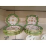 A selection of Coalport green decorated plates