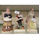 Three Staffordshire figures of the cobbler, the fisherwoman,