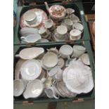 Two trays of ceramic table ware to include cups, saucers,