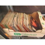 A small tray of 45RPM records by various artists to include Rod Stewart