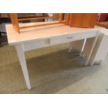 A Formica topped kitchen table with white painted base and single drawer