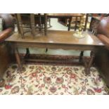 A mid-20th century oak rectangular occasional table