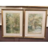 A pair of framed and glazed watercolours of countryside lane and stream scenes signed H Ashdown-Box