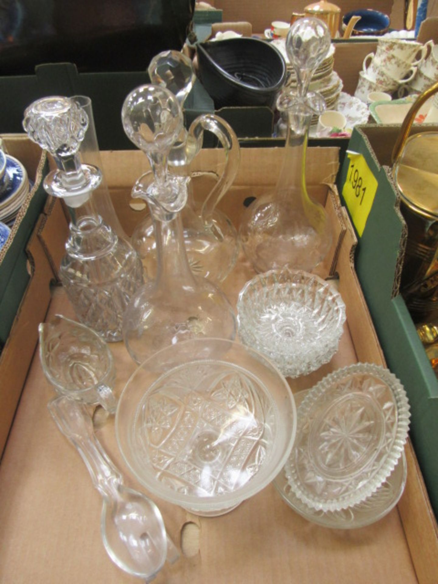 A tray containing glassware to include decanters etc