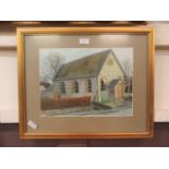 A framed and glazed watercolour of a chapel signed J F E Vickers