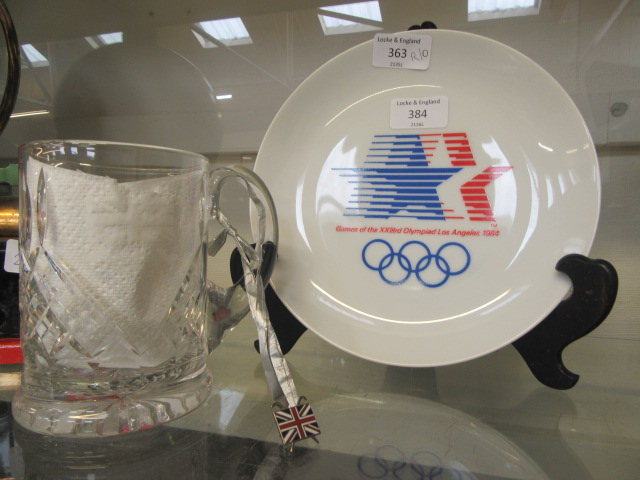 A Los Angeles 1984 Olympic Games plate together with a glass tankard containing a commemorative