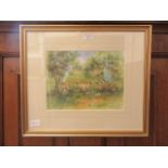 A framed and glazed watercolour of sheep in field signed Nadine Taylor