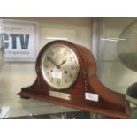 An early 20th-century oak cased mantle clock by H.L.