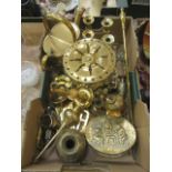 A tray containing a quantity of brass ware to include candlesticks, chestnut roasting pan, jugs,