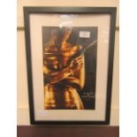 A framed James Bond print celebrating fifty years