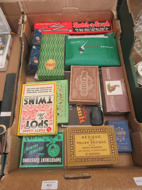 A tray containing a quantity of vintage party games, cards,