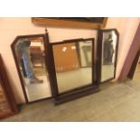 A mid-20th century mahogany framed dressing table with triple mirror