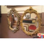 Two ornate gilt framed wall mirrors