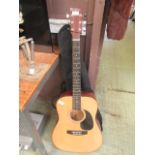 A guitar by Chantry together with one other in black canvas bag