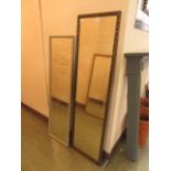 A rectangular grey painted framed wall mirror together with an ornate gilt framed rectangular