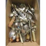 A box containing an assortment of flatware