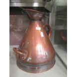 A 19th century copper four gallon jug