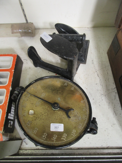 A pair of early-20th century Salter scales together with a flat iron and a cobblers last