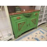 A Victorian green painted sideboard with gilt decoration