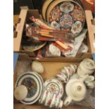 Two trays of ceramic and other ware to include BBQ utensils, cups, saucers,