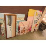 A quantity of modern stretched canvases together with a framed and glazed print of beach scene
