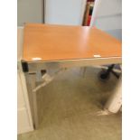 An aluminium folding table