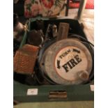 A tray containing metalware to include a fire bell,