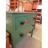 A painted mid-20th century two drawer chest