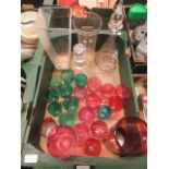 A tray of coloured glassware to include vases, a decanter,