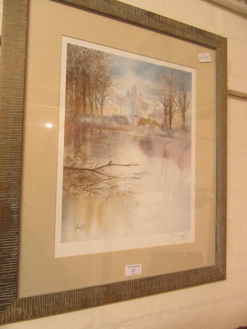 A framed and glazed signed print of house by lake scene