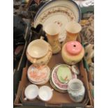 A tray containing an assortment of early-20th century ceramic ware to include meat plates, vases,