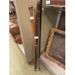 Three assorted walking canes,