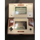 A Nintendo game and watch Donkey Kong II multiscreen