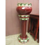 A glazed jardiniere stand with bowl